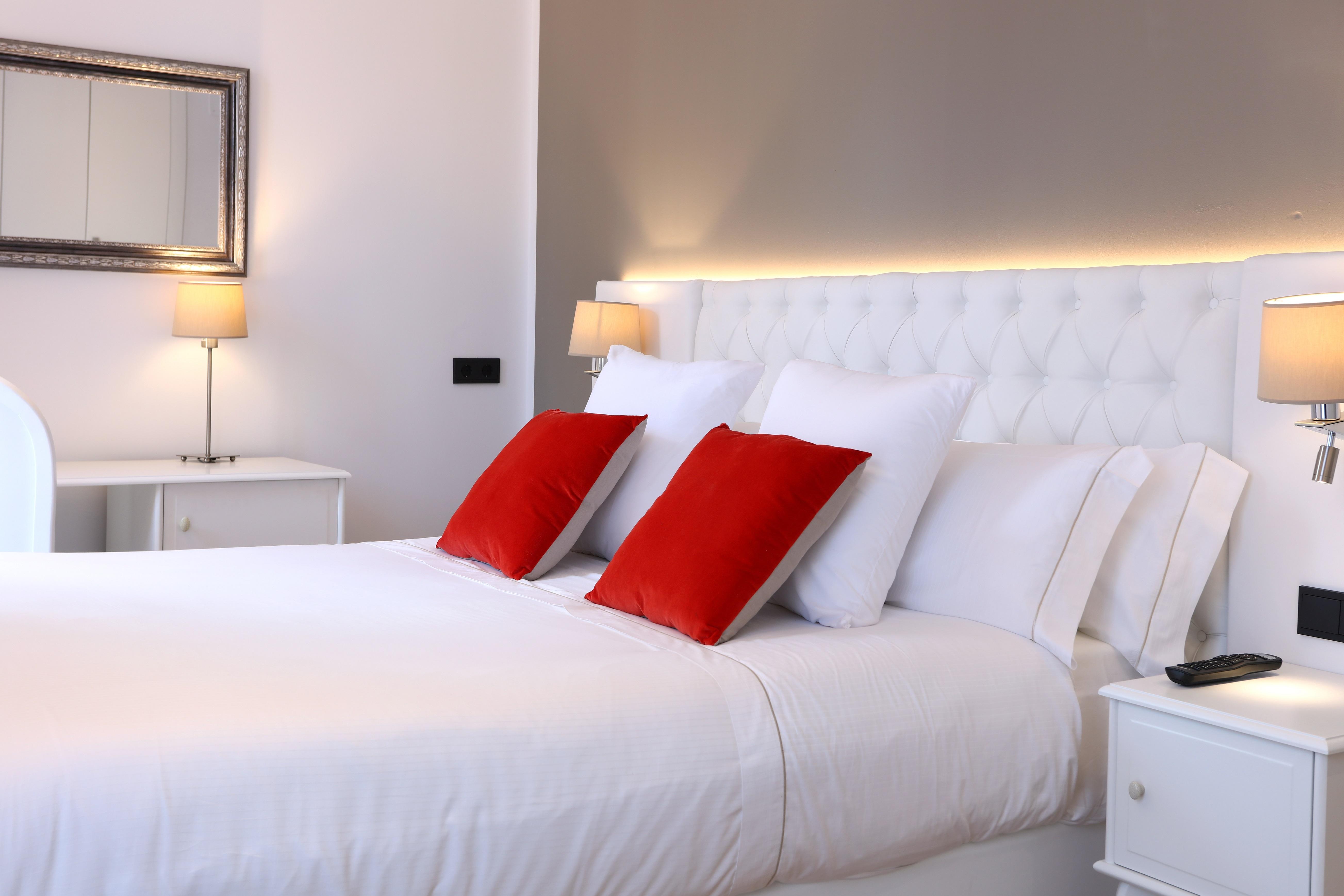 Bo Hotel Palma Екстериор снимка A bedroom in a luxury hotel in Italy.